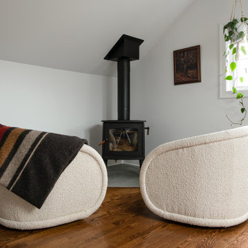 Bungalow Attic Conversion Sitting Area with Freestanding Wood Stove | Arlington
