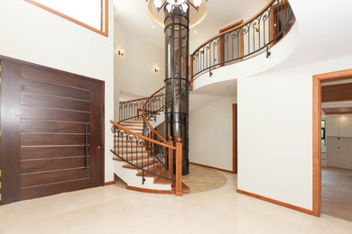 Example of a large minimalist staircase design in Other
