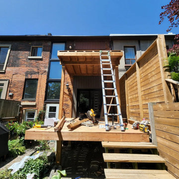 New framing going up for the rebuilt two-level deck in North York