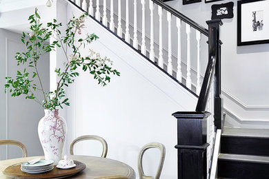 Inspiration for a timeless wooden l-shaped staircase remodel in New York with wooden risers