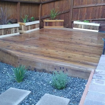 Paver, Stain Deck and Pebbles Patio in Pleasant Hill
