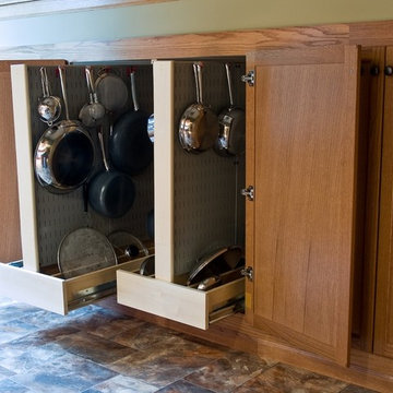 Wall Control pegboard panels and tool board hooks being put to use in a kitchen