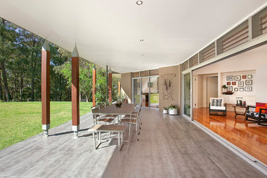 Photo of a modern home design in Central Coast.