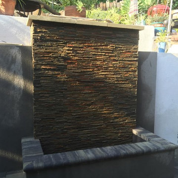 Retaining Wall with Firepit extending out from wall.