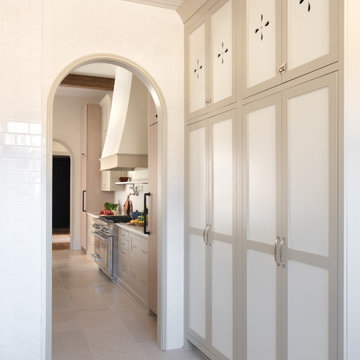 Los Angeles Farmhouse Sink & Open Shelving Pantry Dark Counters Stone Floors