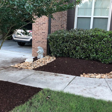 Mulching,pruning,sod, river rock, stepping stone installs