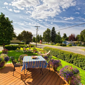 Outdoor Living Spaces Created from Angled Front Deck and Back Decks