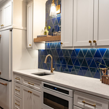 Bold Basement Finish — Linear Gas Fireplace, Wet Bar & Cafe Appliance Suite