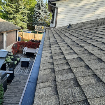 Living room, gutters and downspouts