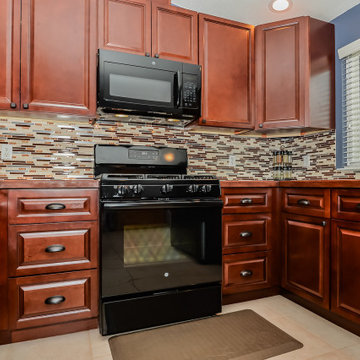 Cherry Raised Panel Kitchen Cabinets