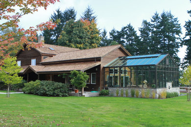 Huge trendy attached greenhouse photo in Vancouver