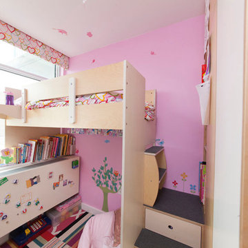 Boerum Hill; A small face is fitted with a loft bed and built-in cabinets