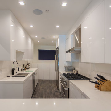 Full Galley Kitchen With Freestanding Gas Range