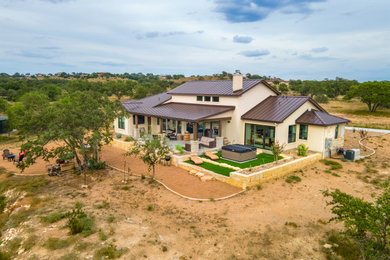 Example of a transitional exterior home design in Austin