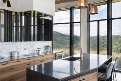 Example of a minimalist l-shaped concrete floor and wood ceiling eat-in kitchen design in Portland with an undermount sink, flat-panel cabinets, medium tone wood cabinets, quartz countertops, white backsplash, marble backsplash, an island and gray countertops