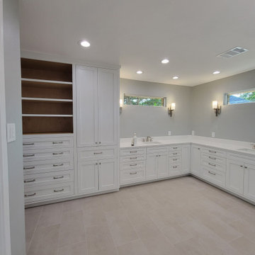 Two separate bathrooms converted into a master bathroom with a big open closet