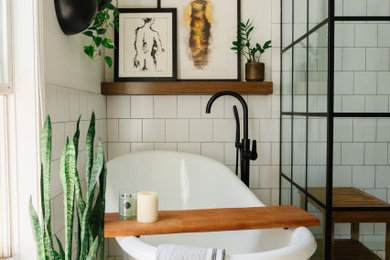 Inspiration for a small eclectic master ceramic tile, white floor and single-sink bathroom remodel in Atlanta with flat-panel cabinets, medium tone wood cabinets, white walls, an undermount sink, marble countertops, a hinged shower door and a built-in vanity
