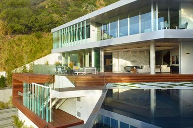 Inspiration for a large modern three-story mixed siding exterior home remodel in Los Angeles