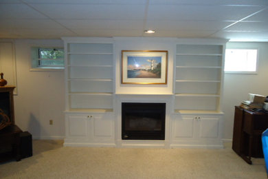Bookcases by fireplace