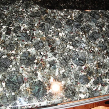 Verde Butterfly Granite with White Kitchen Cabinets 1 4 12