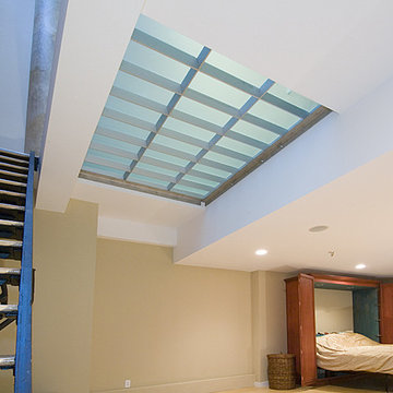 Structural glass flooring system from underneath with obscure glass