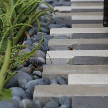 Plank Pavers & Pebbles make a stunning Design