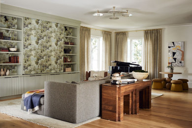 Living room - transitional medium tone wood floor and brown floor living room idea in Charlotte with beige walls