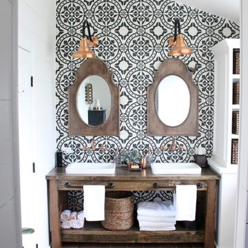 Bathroom Remodel Featuring Copper Lighting