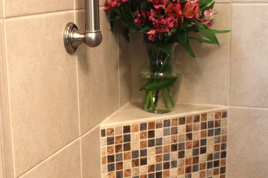 Inspiration for a 1950s brown tile bathroom remodel in DC Metro