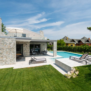 Stilmix Garten mit Betonplatten in Bologna