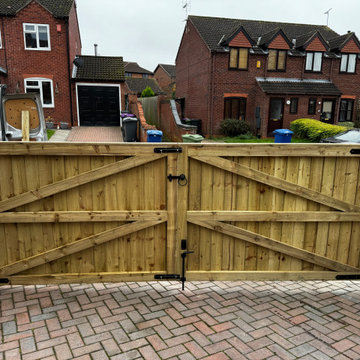 Braced Timber Driveway Gates Across a Block Paved Entrance