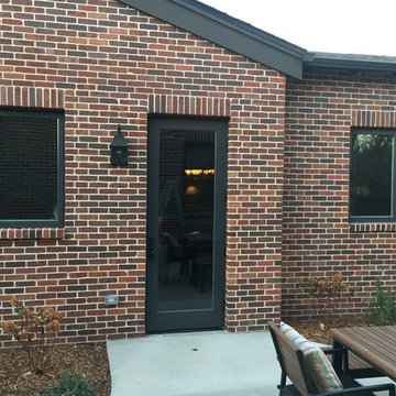 Tudor home with Andersen 100 Series and E-Series windows and doors
