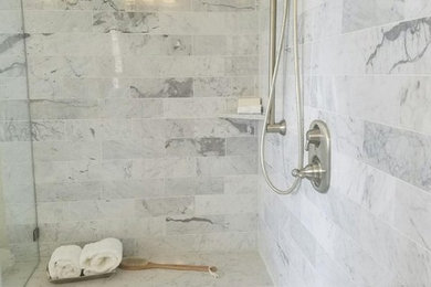 Design ideas for a mid-sized transitional 3/4 bathroom in Houston with an alcove shower, white tile, marble and a hinged shower door.