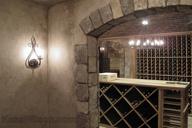 Elegant wine cellar photo in Atlanta with storage racks