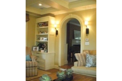 Example of a transitional family room design in Boston