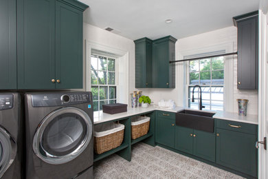 Transitional l-shaped laundry room photo in Philadelphia with raised-panel cabinets and a side-by-side washer/dryer