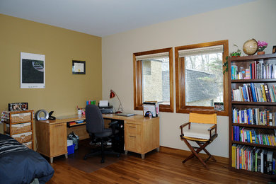 Mid-sized guest dark wood floor bedroom photo in Other with no fireplace