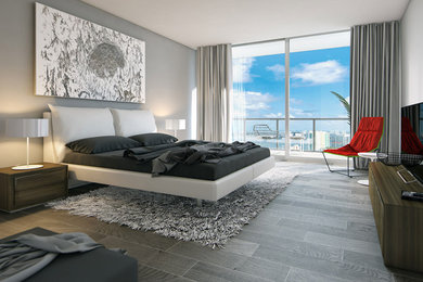 This is an example of a mid-sized modern guest bedroom in Miami with grey walls.
