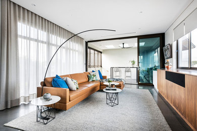 Contemporary living room in Perth with white walls and a concealed tv.