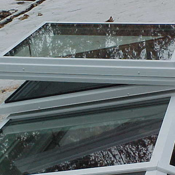 Ridge Skylight with Vertical lite and operable sections