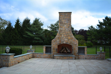 Example of a mid-sized classic patio design in New York