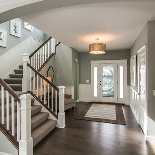 Inspiration for a medium sized classic carpeted u-shaped staircase in Minneapolis with carpeted risers.