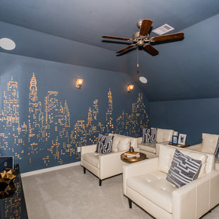 Example of a transitional enclosed carpeted and beige floor home theater design in Houston with blue walls and a wall-mounted tv