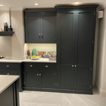 Modern monochrome handmade kitchen with full length larder