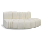 Meridian Furniture - Arc Vegan Leather Upholstered 3-Pc. S-Shaped Modular Sofa, Cream - Unleash modern opulence with the Arc Vegan Leather 3pc. Sectional. Crafted for the modern connoisseur, this Sectional injects an air of refined luxury into any space. Its sleek silhouette, upholstered in supple cream vegan leather, exudes timeless sophistication while the deep channel tufting adds textural intrigue, further elevating the chair's visual appeal. The modular design makes it a versatile chameleon, effortlessly adapting to your evolving needs and preferences. Whether you envision it gracing a chic living room corner, basking in the glow of a bedroom window, or adding a touch of drama to a home office, the Arc seamlessly complements your unique interior aesthetic.