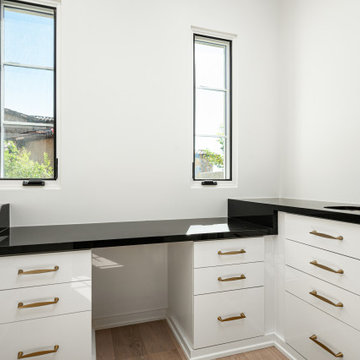 Utility Room with Black Countertops