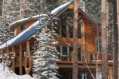 Rustic exterior home idea in Other