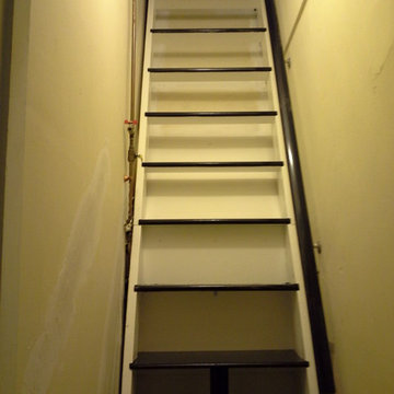 Storage ships ladder in a brownstone walk-up