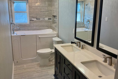 Example of a mid-sized 3/4 bathroom design in Houston with a built-in vanity
