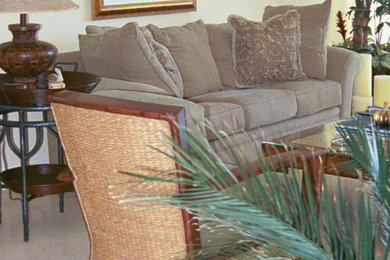 Living room - mid-sized tropical open concept living room idea in Miami with beige walls, no fireplace and no tv